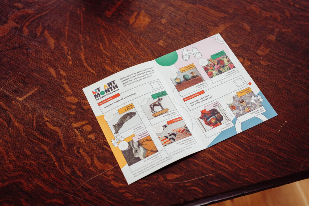 New Town Art Month scavenger hunt flyer with art and nature illustrations.
