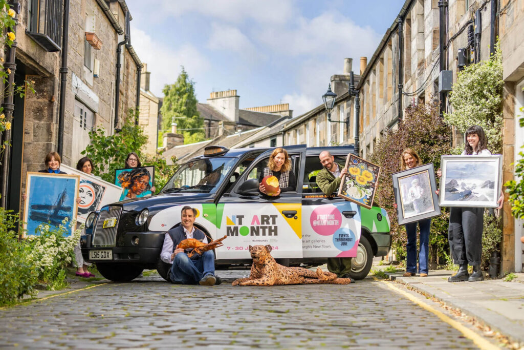 New Town Art Month taxi with people holding art, Edinburgh