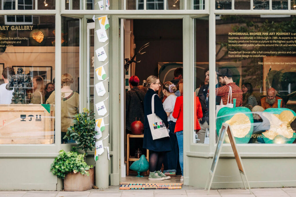 People browse art and sculptures at an Edinburgh gallery during New Town Art Month.