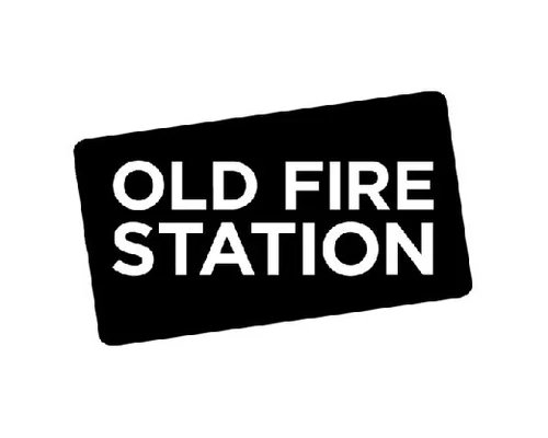 Black sign with white text: OLD FIRE STATION