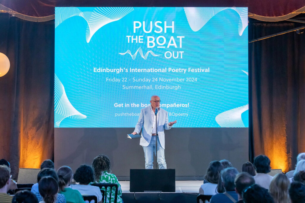 Man speaking at Push the Boat Out Edinburgh International Poetry Festival
