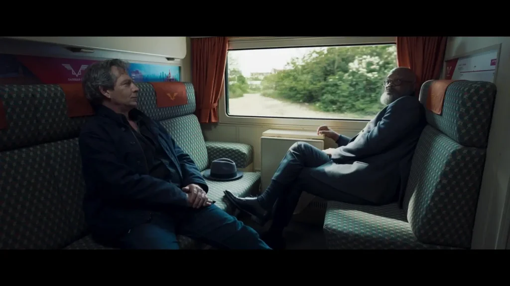 Samuel L. Jackson and Ben Mendelsohn on a train in Secret Invasion.