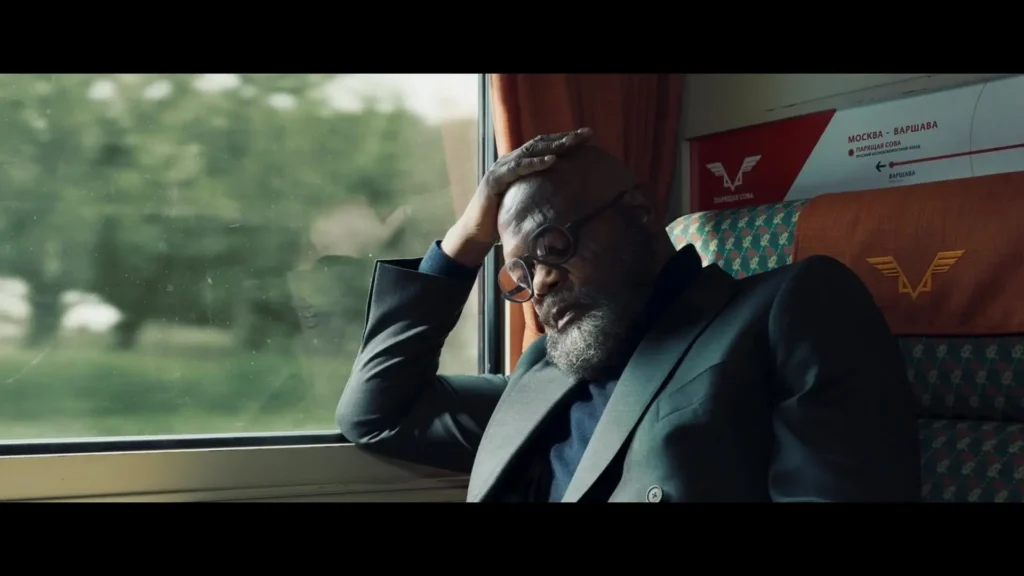 Nick Fury on a train, looking stressed during Secret Invasion.