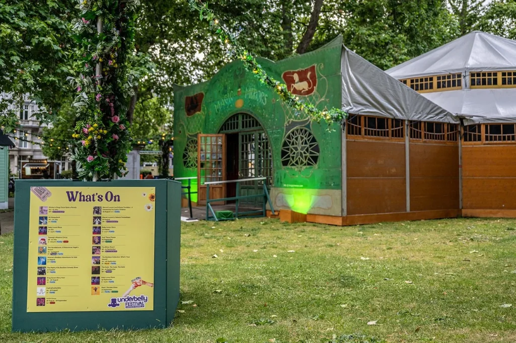 Underbelly Festival Cavendish Square entrance with "What's On" sign.