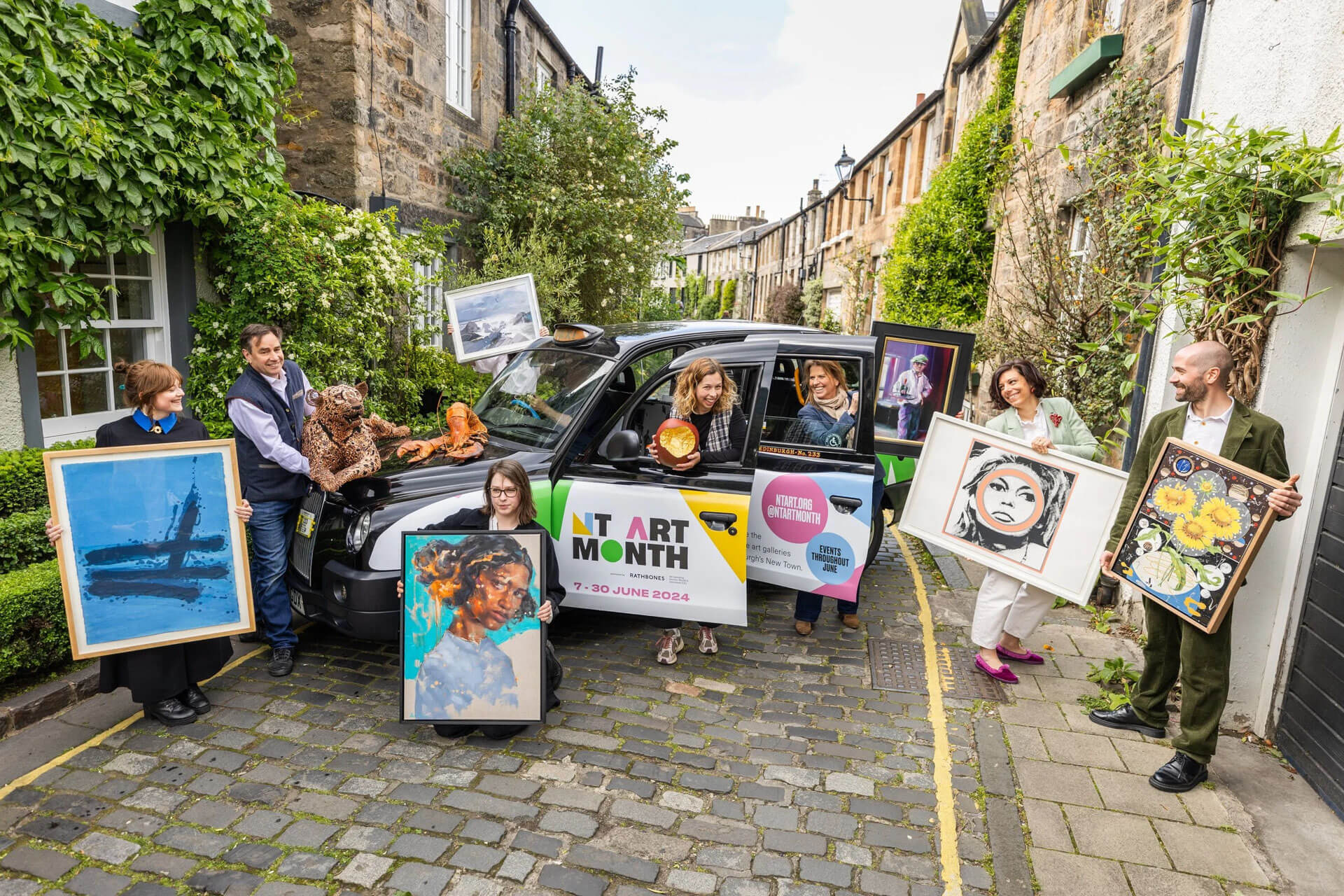 Edinburgh Art Month 2024: People with art and a taxi